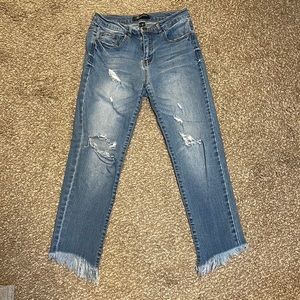 Distressed raw hem jeans